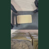 Video de demonstration de l'ice hash CBD : bloc de resine CBD de couleur jaune dore translucide, texture lisse et dense, tenu et coupe avec un cutter par des mains gantees de noir sur un plan de travail gris anthracite. Packagings de produits CBD visibles en arriere-plan. Ice hash CBD puissant disponible a l'achat sur CBD Pas Cher 14, livraison France, taux THC inferieur a 0,3%.